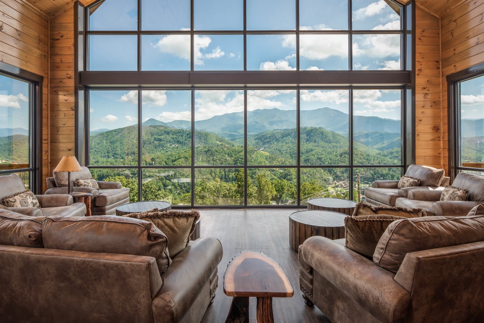 Great room with floor-to-ceiling mountain views
