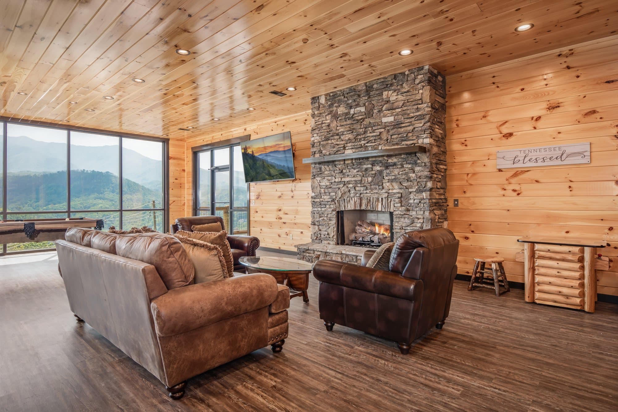 Seating by the stone fireplace
