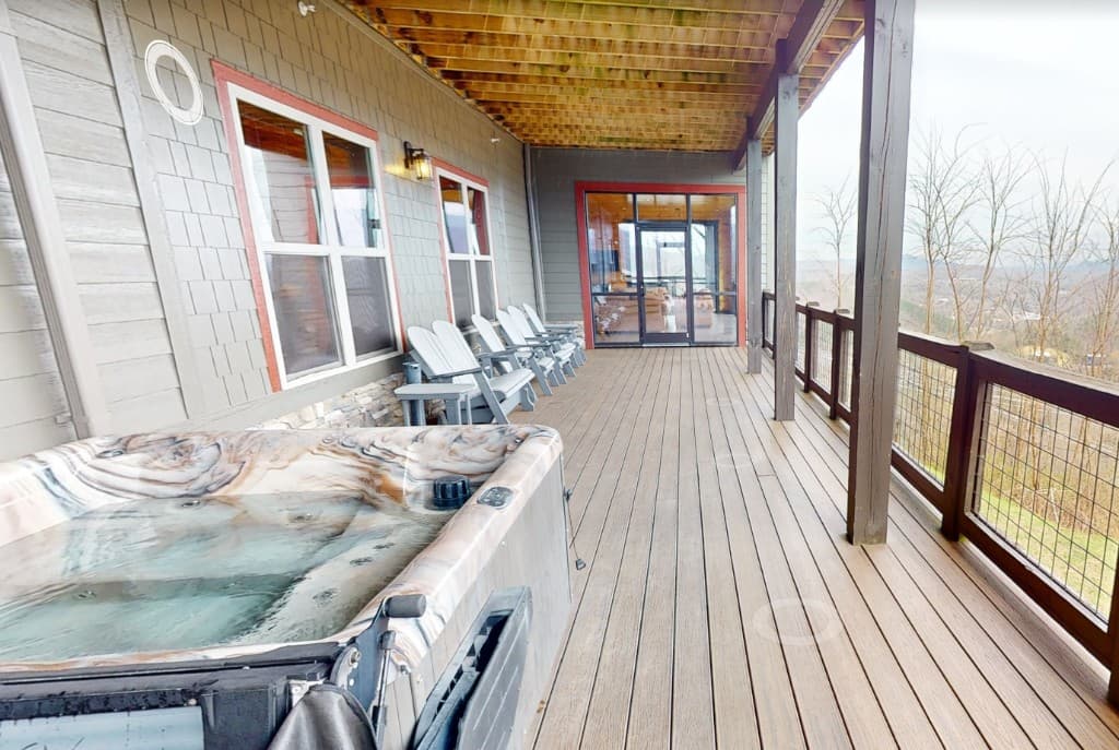 Hot tub on the covered deck overlooking Gatlinburg